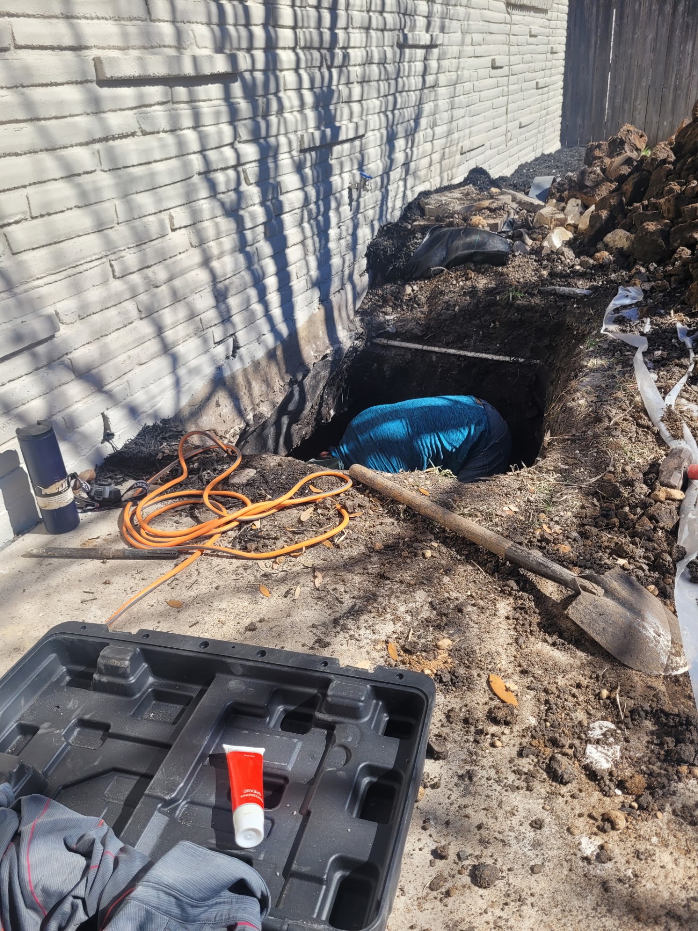 Hand-tunneling beneath a slab foundation